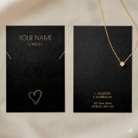 visning av guld, litet hjärthalsband eller armband