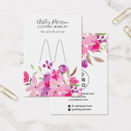 Visning av innehavare av rosa blommigt ring visitkort