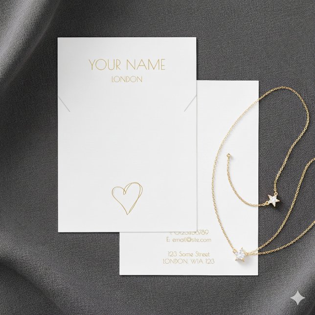 Visning av vithjärthalsband i guld visitkort (White gold heart necklace bracelet display card with contact details.)
