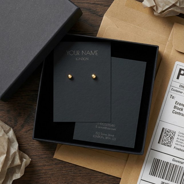 Visning för enkel mörk visitkort (Simple dark earring display card.)