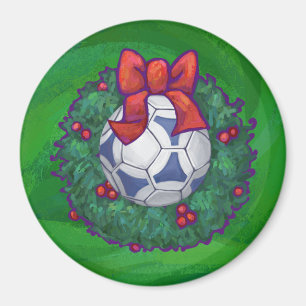 Vit, blå festlig fotboll på grönt underlag magnet