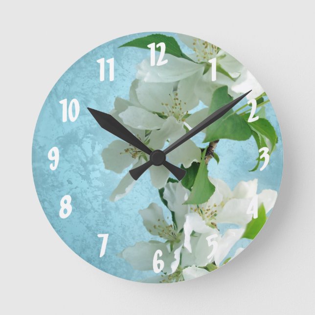 Vit blomma på Blue S Monogram första väggklocka (Framsida)