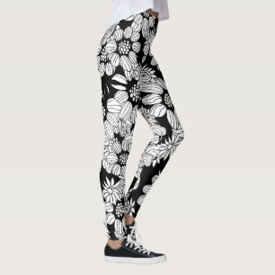 Vit blommar på en svart bakgrund leggings
