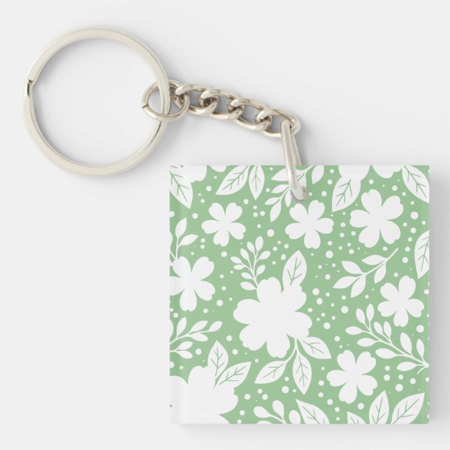 Vit blomsterdesign på mjuk grön bakgrund (Framsidan)