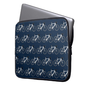 Vit cykel på marinblå laptop fodral
