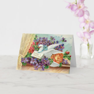 Vit duva på fönsterbräda Lila blommor Födelsedag Kort