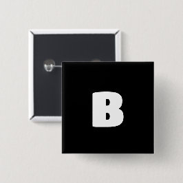 Vit fet inledning på svart knapp