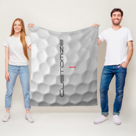 Vit golfboll med gropig textur och anpassat namn o fleecefilt
