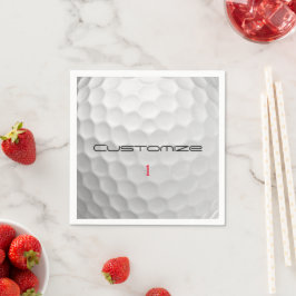 Vit golfboll med gropig textur och anpassat namn o pappersservett