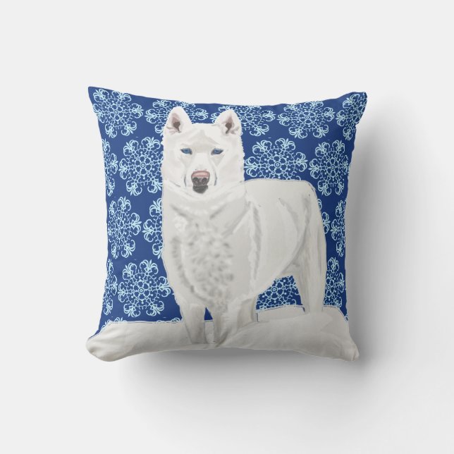 Vit Husky mot snöflingor och mörkblå himmel. Kudde (Framsida)