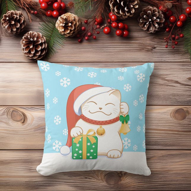 Vit julklapp i en röd hatt kudde (Skapare uppladdad)