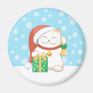 Vit julklapp i en röd hatt magnet