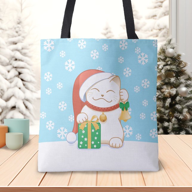 Vit julklapp i en röd hatt tygkasse (Skapare uppladdad)