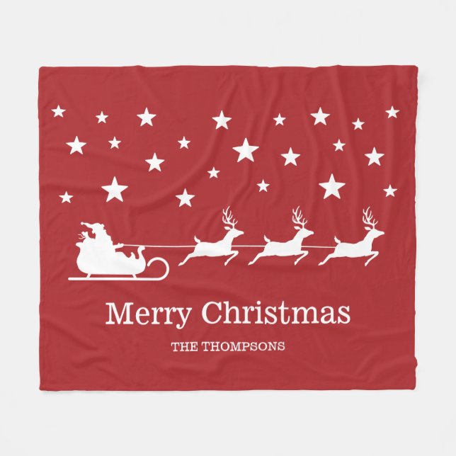 Vit jultomtesläde och glad jul text på rött fleecefilt (Framsidan (Horisontell))