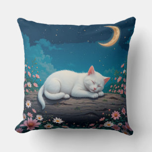 Vit katt som sover fridfullt på en stock kudde
