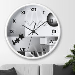 Vit konst Deco-muskel i Stil Rund Klocka<br><div class="desc">Väggklocka med en lekfull konsdecodesign i svartvitt.</div>