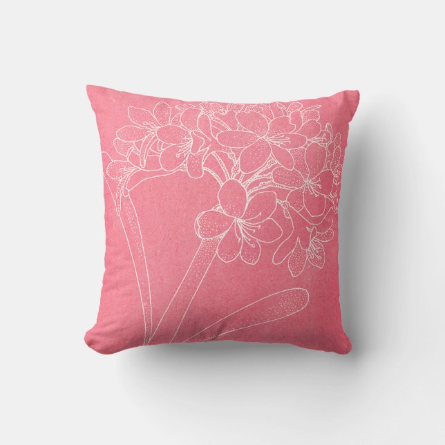 Vit kontur av en stor blomma på rosa kudde (Framsida)