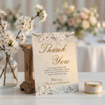 Vit körsbärsblom och guldskrift bröllop