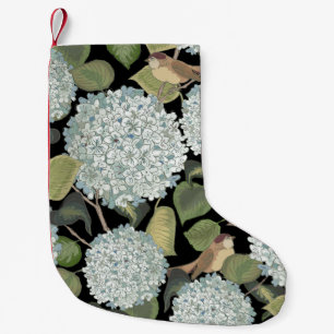 Vit, ljusblå Hortensia med grönt löv och Liten Julstrumpa