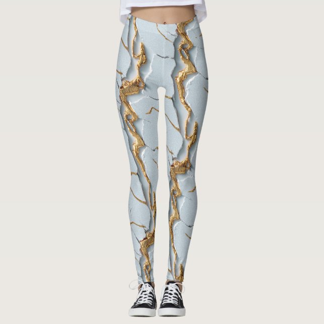Vit marmorstruktur med sprickiga guldådror leggings (Framsida)