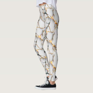 Vit marmortextur med lysande gyllene ådror leggings