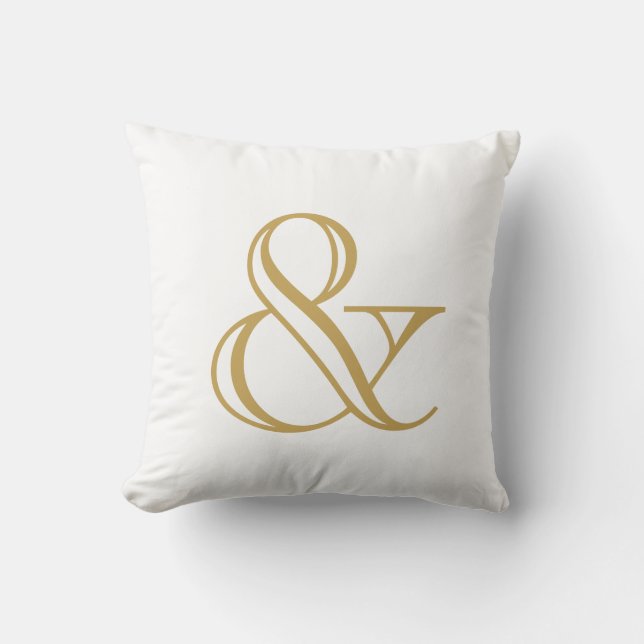 Vit och guld et-tecken kudde (Framsida)