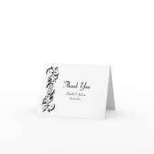 Vit och svart blomsterutsmyckad utsirad vigsel