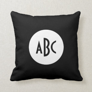 Vit och svart cirkelmonogram kudde