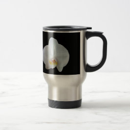 Vit orchid mot svart bakgrund resemugg