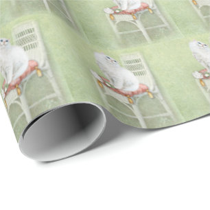 vit persisk katt på stolskuddar presentpapper