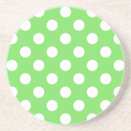 Vit polka dots på äppelgrönt underlägg