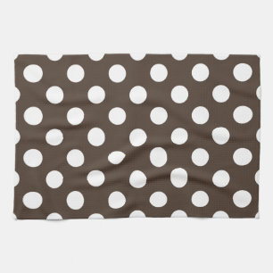Vit polka dots på brunt kökshandduk
