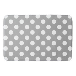 Vit polka dots på grått badrumsmatta