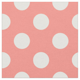 Vit polka dots på persika tyg