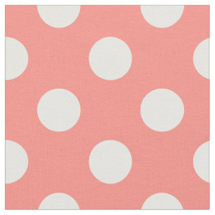 Vit polka dots på persika tyg