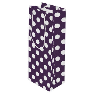 Vit polka dots på plommons lila