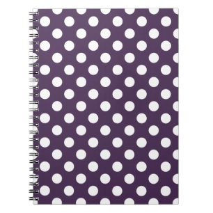 Vit polka dots på plommons lila anteckningsbok med spiral