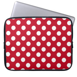 Vit polka dots på rött laptop fodral