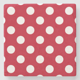 Vit polka dots på rött underlägg sten