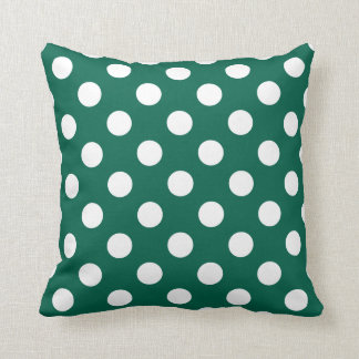 Vit polka dots på sädesvätska, grönt kudde