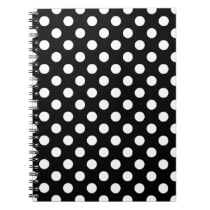 Vit polka dots på svart anteckningsbok med spiral