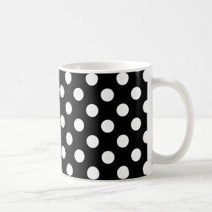 Vit polka dots på svart kaffemugg