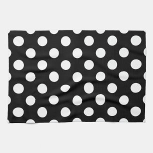 Vit polka dots på svart kökshandduk