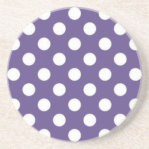Vit polka dots på ultraviolett underlägg