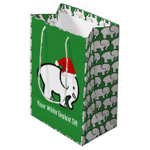 Vit presentbag med elefant i julhatt