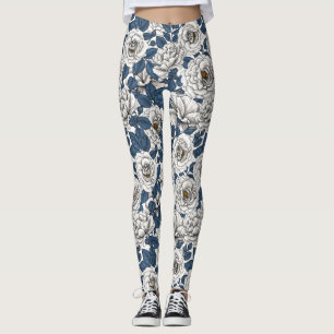 Vit ros med blå löv på vitt leggings
