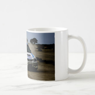 Vit samlar bilen kaffemugg