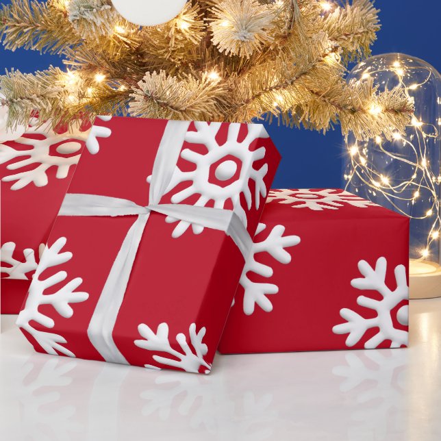 Vit snöflingor på den röda julen presentpapper (Helgdagar)
