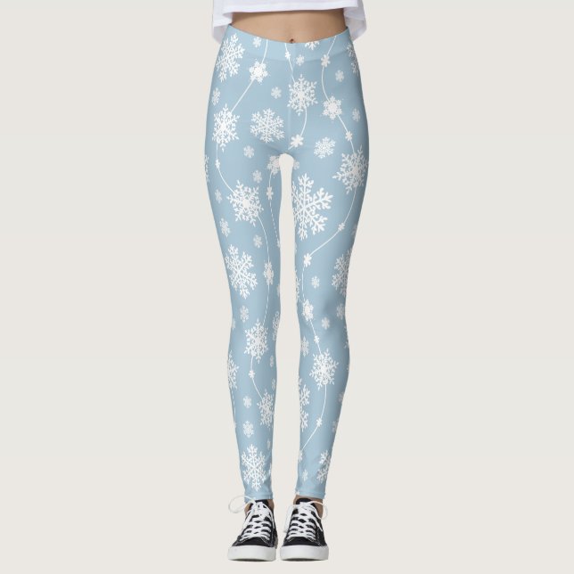 Vit Snöflingor på ljusblå bakgrundsvisare Leggings (Framsida)