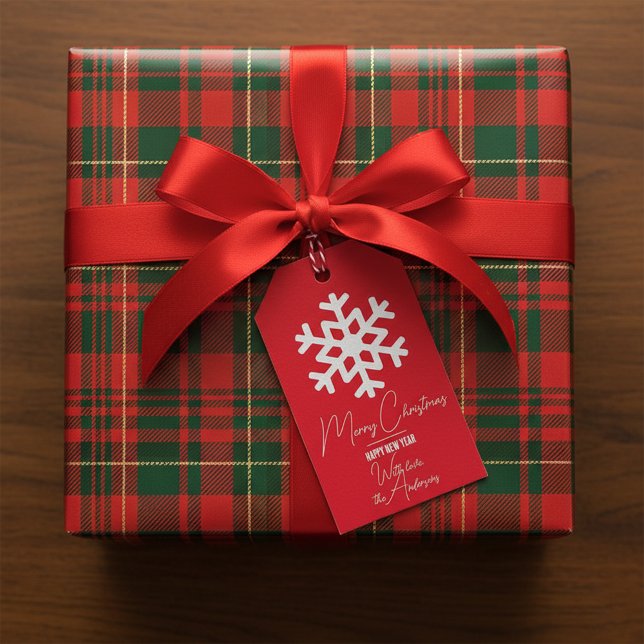 Vit snöflingor på Röda Helgdag jul - nyår Presentetikett (Skapare uppladdad)